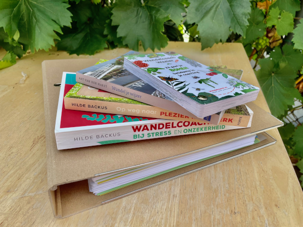 Overzicht met boeken over coachen, loopbaancoachen en wandelcoachen